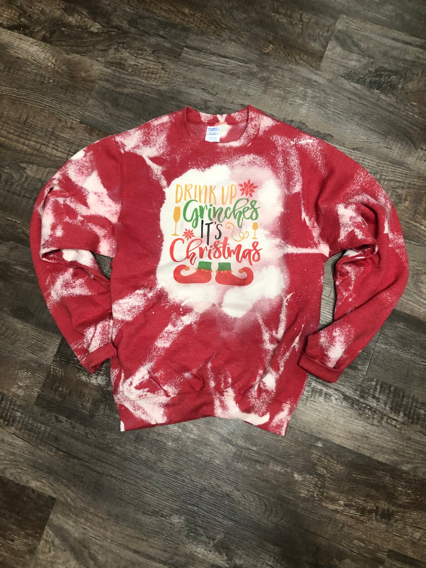 Drink up Ginches it’s Christmas on a red bleached sweatshirt 