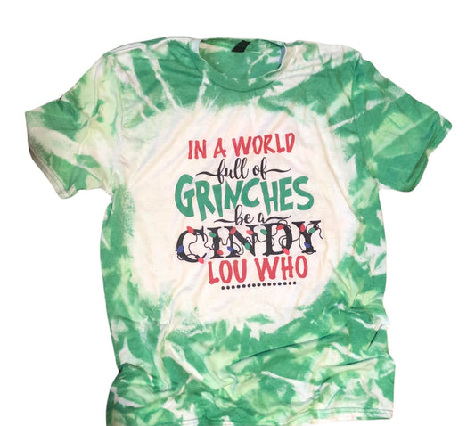 In a World Full of Grinches be a Cindy Lou Bleached Tee - Liv's Boutique