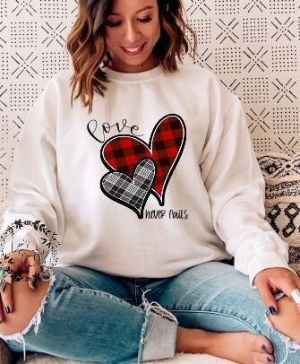 Love Never Fails Sweatshirt, Religious Love Shirt, Valentines Day Shirt, Be Mine Shirt, Gift for Her, Plaid Valentines Day Shirt - Liv's Boutique